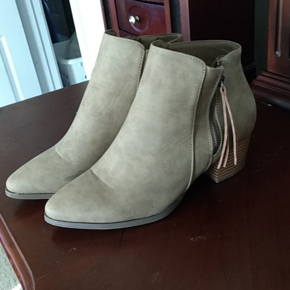 Taupe booties with tassell zip detail